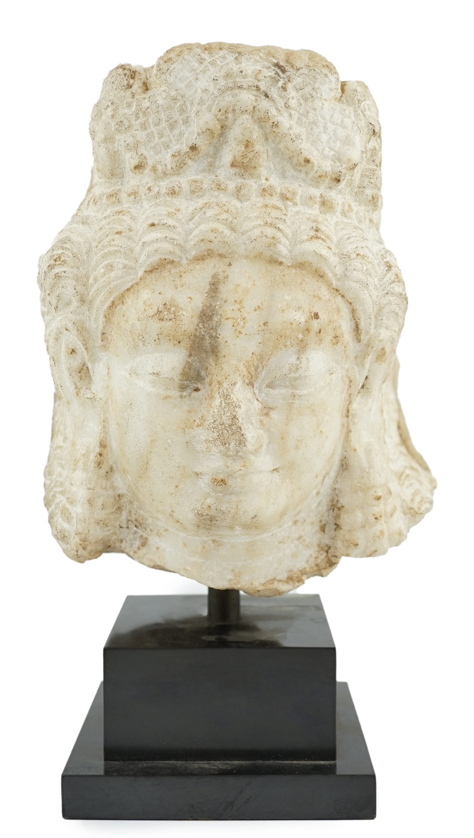 A marble head of a deity, Northwest India, Hindu Shahi period, 6th/7th century A.D.